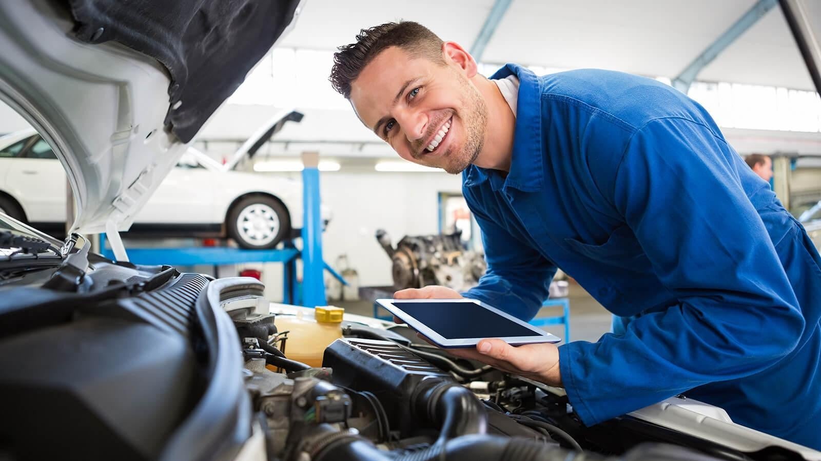 technician looking at an engine at Faulkner Hyundai Harrisburg in Harrisburg PA 